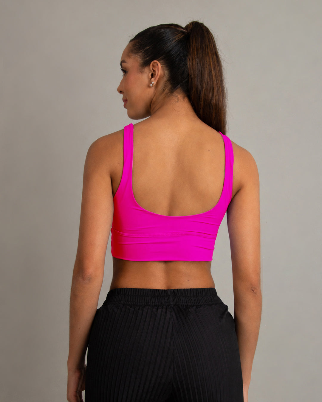 Top con Sesgos Fucsia
